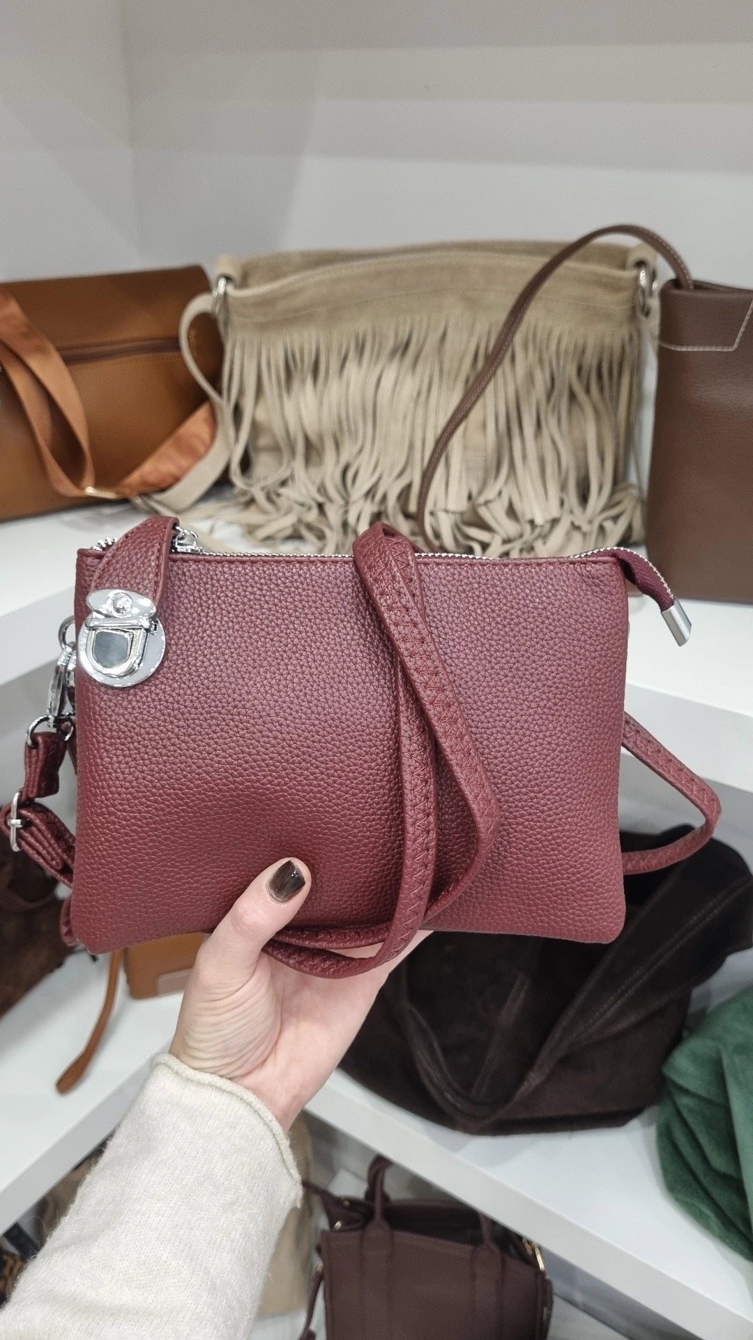 Clasp crossbody bag in burgandy