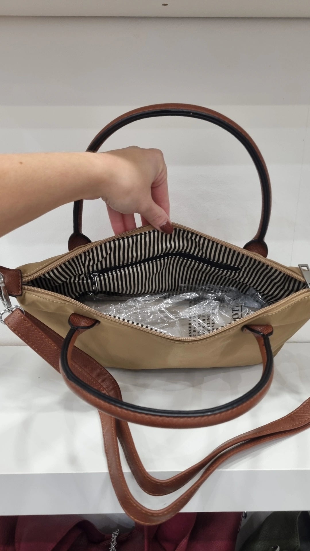 Grab top crossbody bag in beige