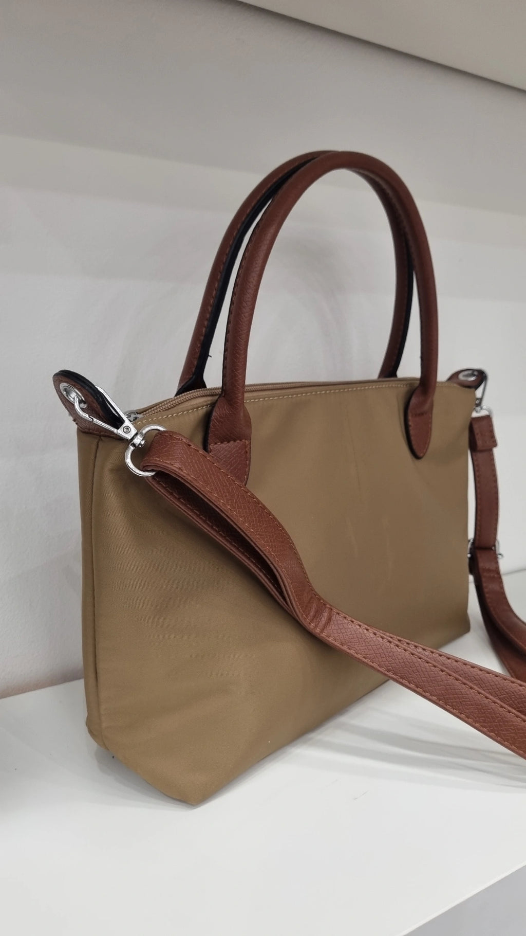 Grab top crossbody bag in beige