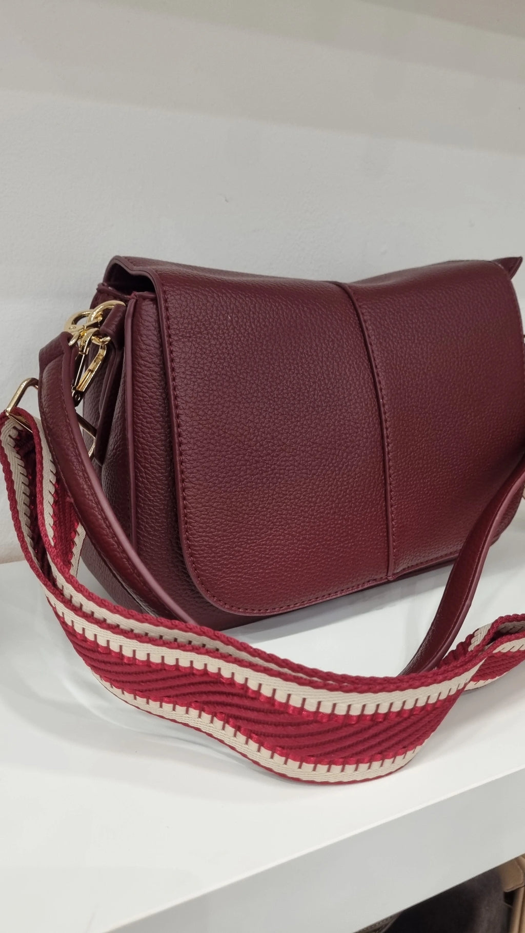 Saddle crossbody bag in burgandy