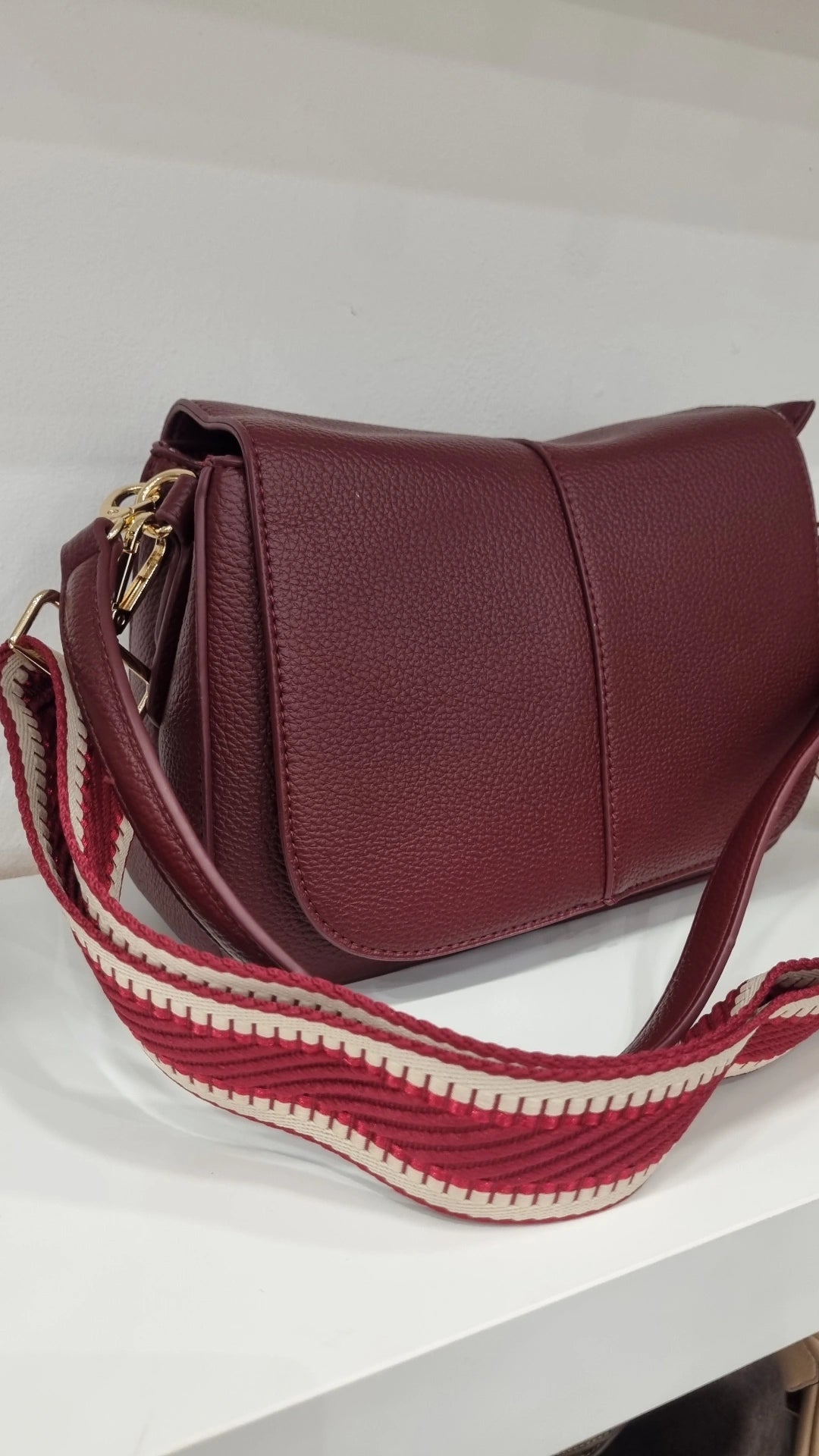 Saddle crossbody bag in burgandy