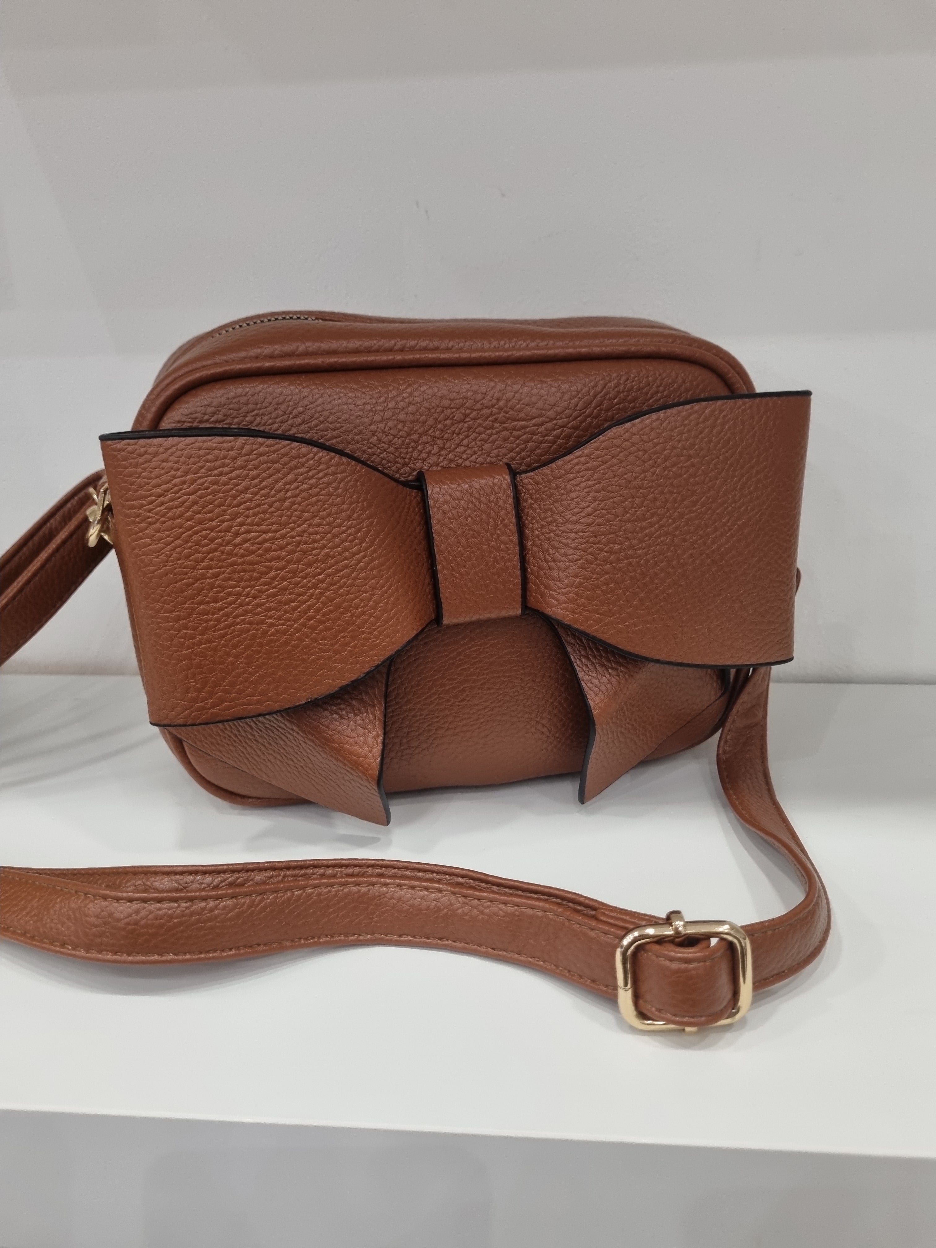 Bow detail crossbody bag in tan