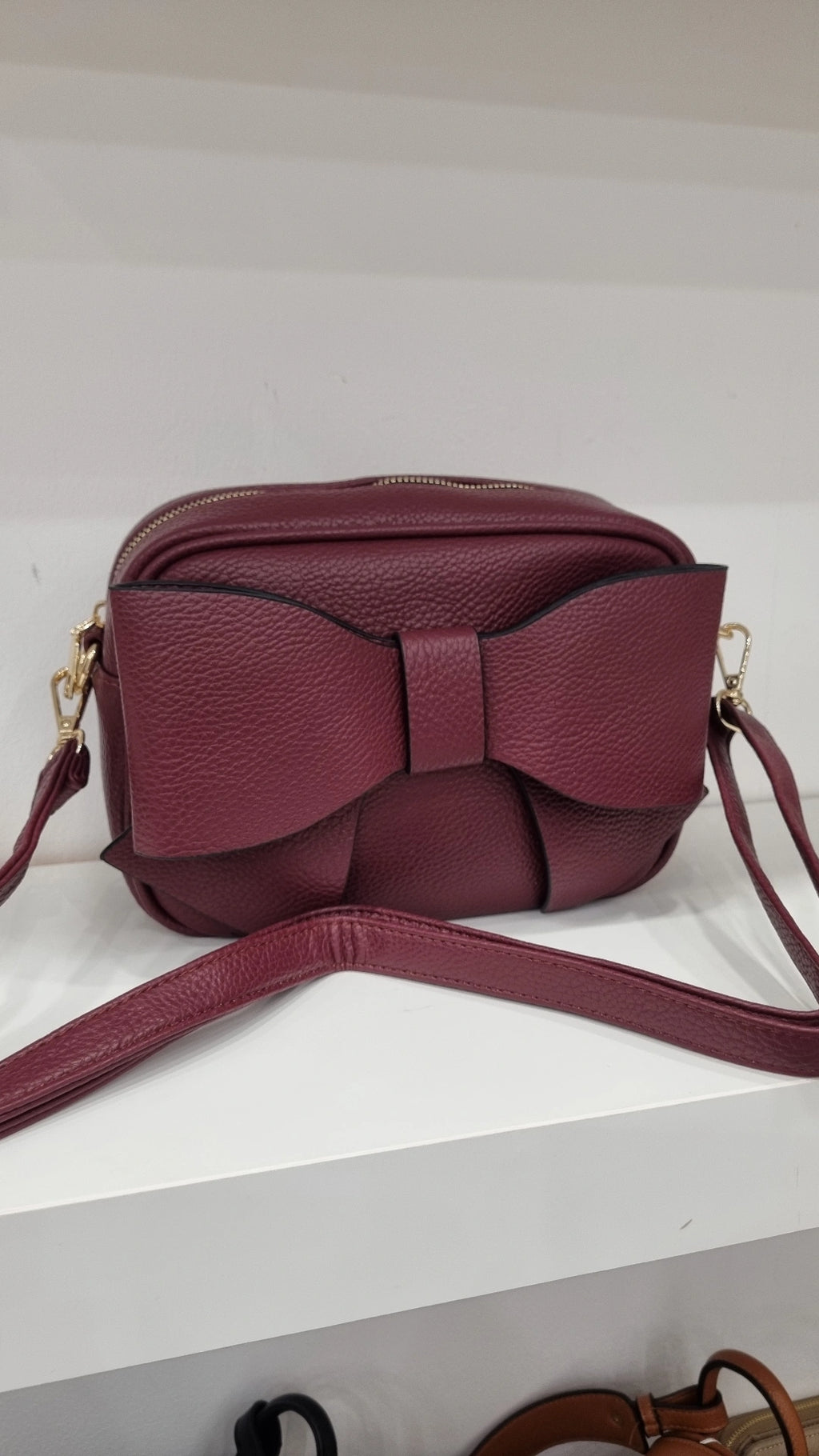 Bow detail crosbsody camera bag in burgandy