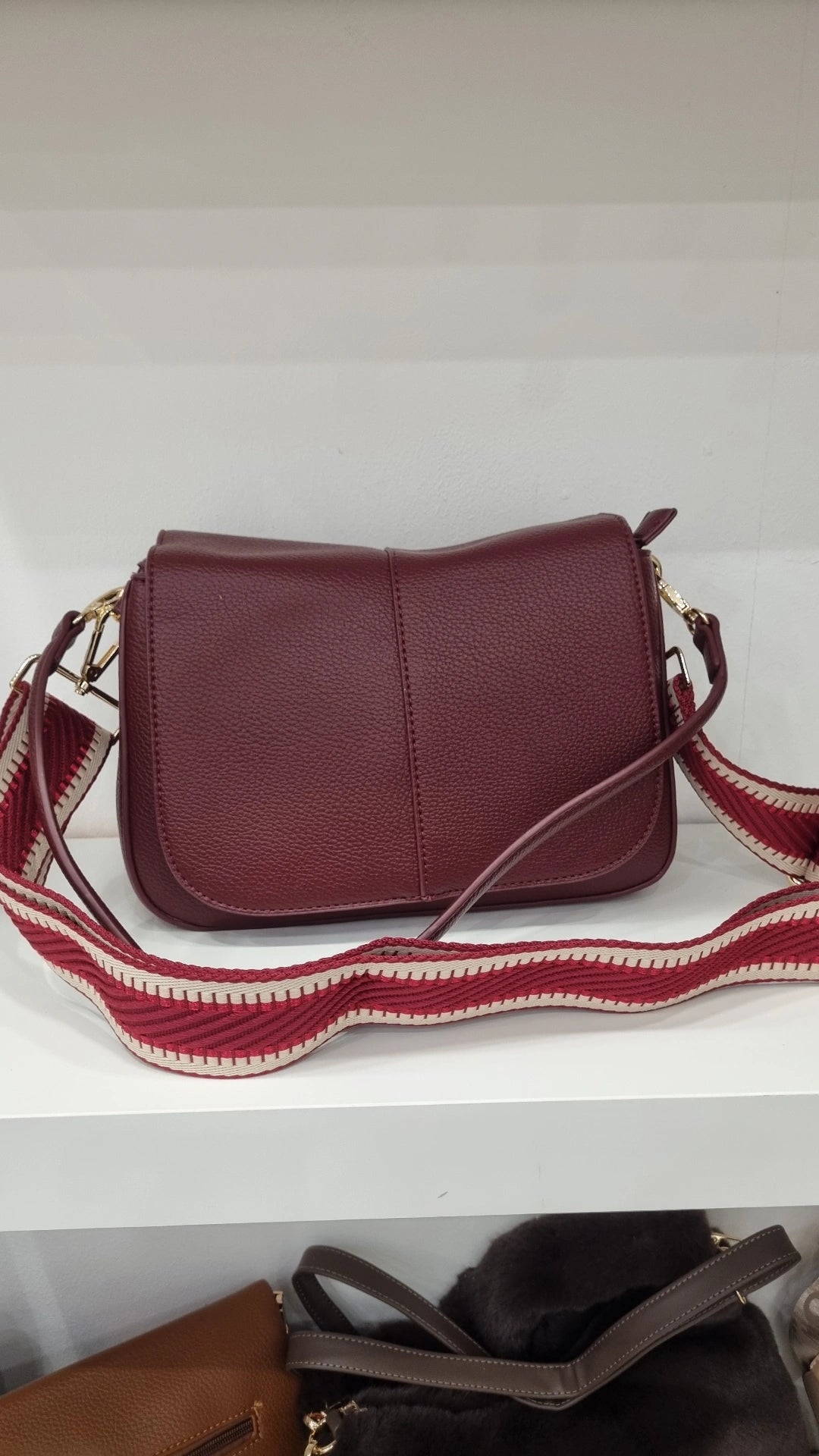 Saddle crossbody bag in burgandy