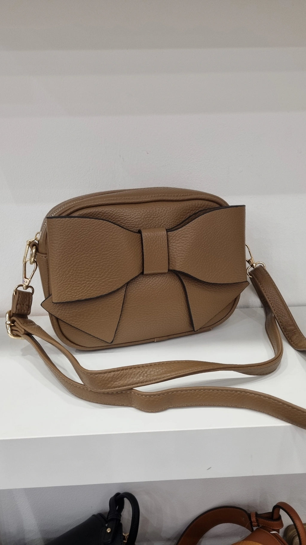 Bow detail crossbody camera bag in beige