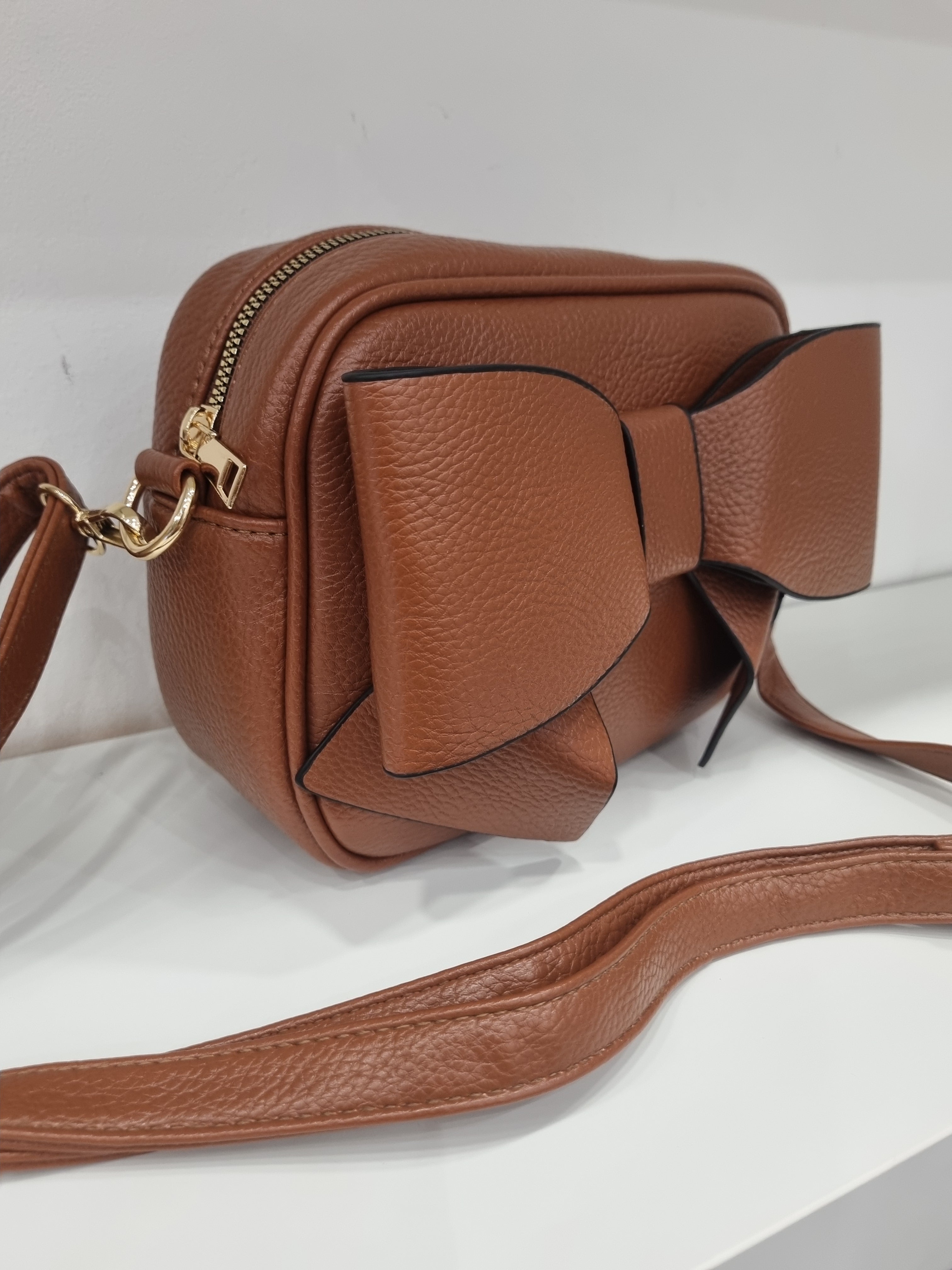 Bow detail crossbody bag in tan